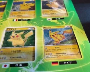 Rare Pikachu World Collection Green Ver promo card featuring Ken Sugimori illustration of baby Pikachu