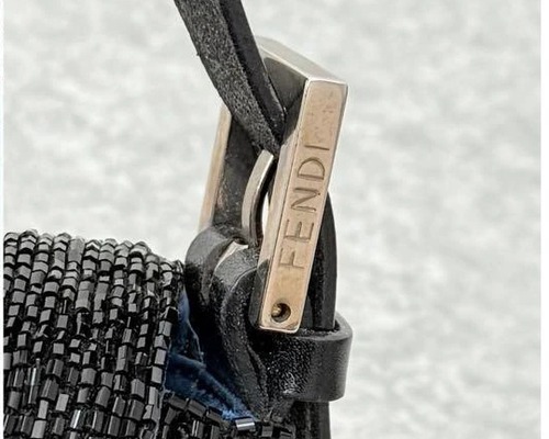 Marking on the strap buckle hardware of the FENDI Mamma Baguette