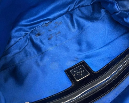 Full interior of the FENDI Mamma Baguette with its satin lining