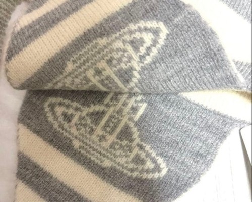 Orbs on the ear flaps, gray on white and white on gray
